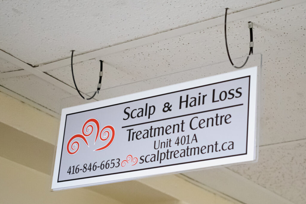 Scalp & Hair Loss Treatment Centre On Location Sign